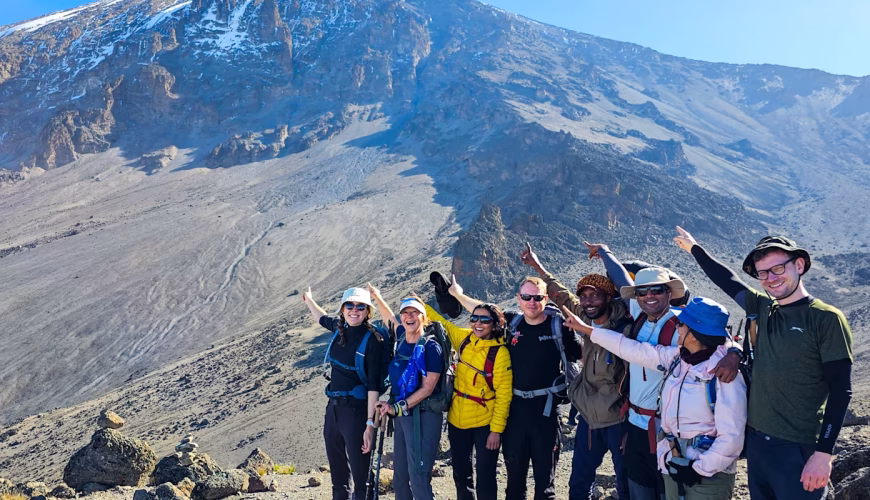 After climbing kilimanjaro mountain group picture